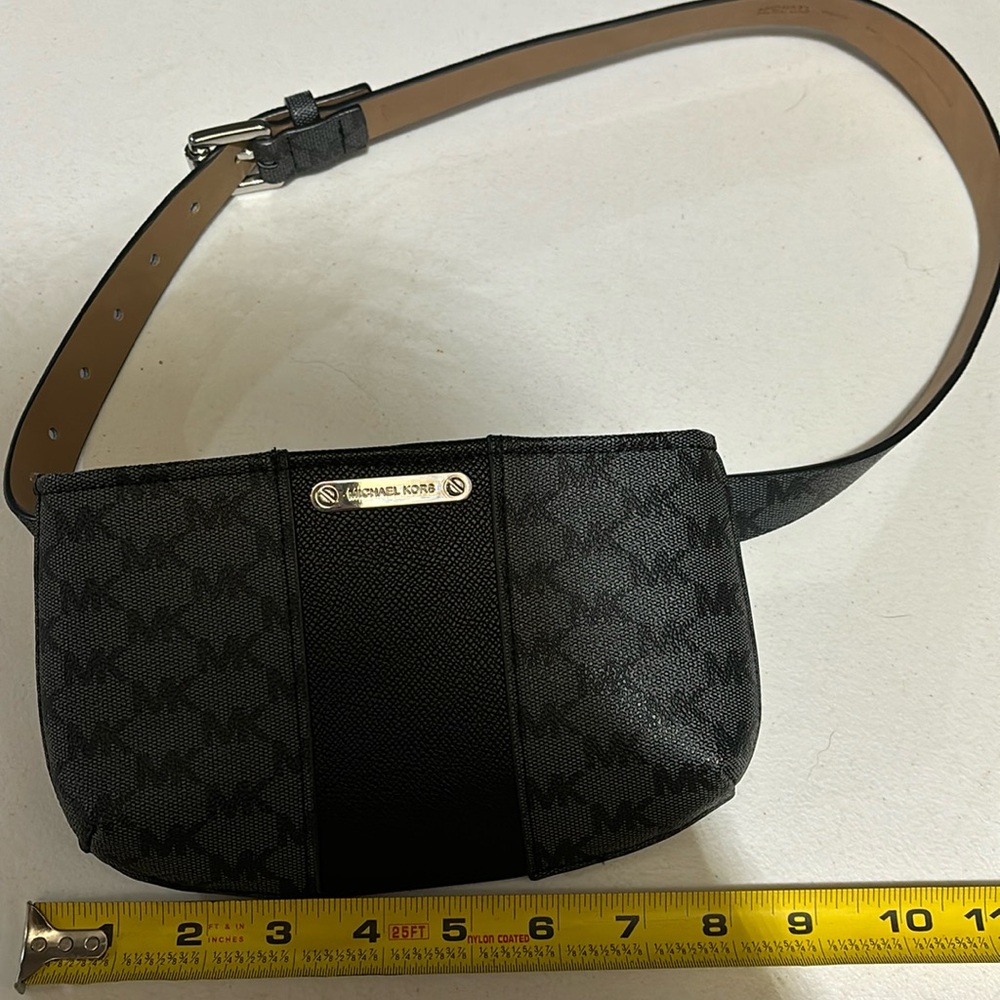 Michael Kors Fanny Pack size small with adjustable belt.
